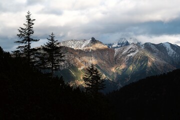 Peaks of the Slovak High Tatras in the evening light, view from blue trail to Sea Eye pond (Morskie Oko), Carpathians, Poland