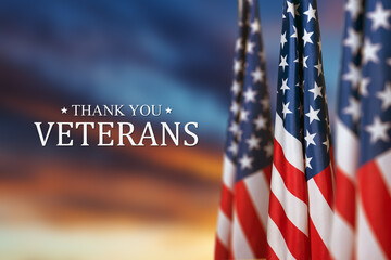 American flags with Text Thank You Veterans on sunset background. American holiday banner. - obrazy, fototapety, plakaty