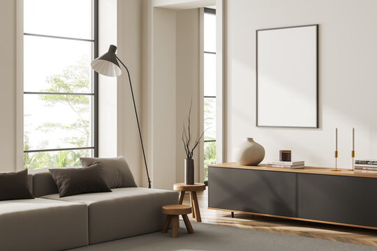 Stylish living room interior with couch and panoramic window. Mockup frame