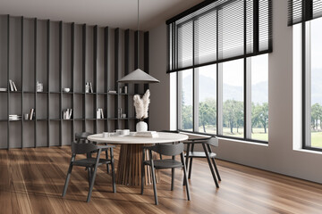 Corner view on bright dining room interior with dining table