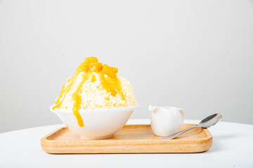 Mango Japanese shaved ice. Snow ice with Mango toping and milk.