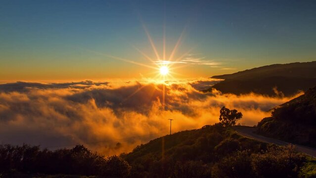 Lockdown Time Lapse Shot Of Moving Clouds Against Beautiful Sunset In Background - San Luis Obispo, California