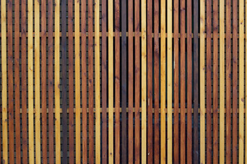 background cute multicolored wooden vertical fence rails.