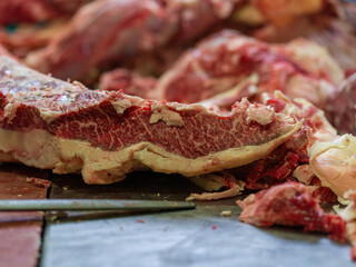 Fresh Wagyu Meat being cut in butcher's shop