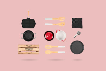 Kitchenware. Cooking set. Appliances and utensils. Cooking book cover. Isolated. Saucepan, casserole dish, griddle, kitchen towel, cake tin. Top view. 