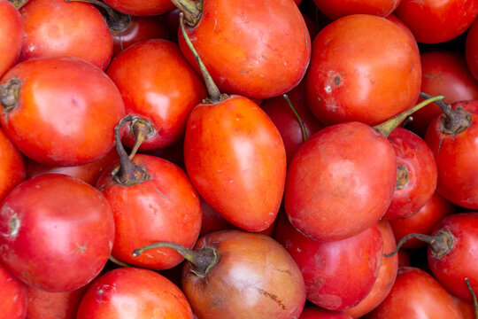 The tamarillo (Solanum betaceum) is an egg-shaped edible fruit. It is also known as the tree tomato, tomate de arbol, tomate andino, tomate serrano, blood fruit, tomate de yuca and Dutch eggplant.