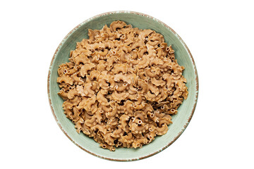 Raw paste in a bowl isolated on white background, italian food. Close-up view from the top.