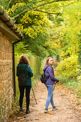 Obraz premium Family walking in the woods.