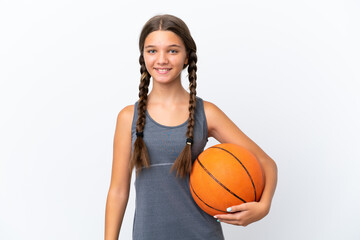 Little caucasian girl isolated on white background playing basketball