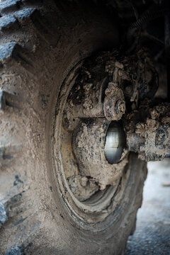 Off-road Truck Steering Knuckle Covered In Mud