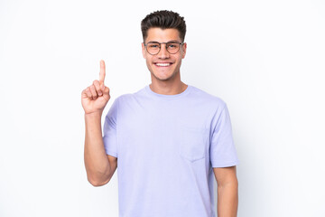 Fototapeta premium Young caucasian man isolated on white background pointing up a great idea