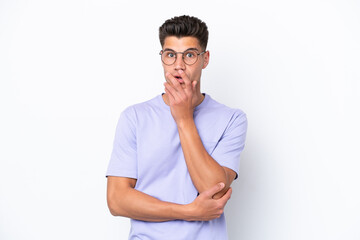 Fototapeta premium Young caucasian man isolated on white background surprised and shocked while looking right