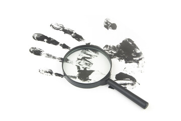 Magnifying lens and black hand print on white background. Investigation concept.	