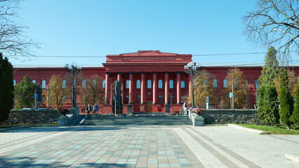 Kyiv, Ukraine - October 16, 2022: Taras Shevchenko National University in Kyiv, red building. - obrazy, fototapety, plakaty