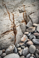 Natural rock texture of a colorful rock formations in silence beach (playa del Silencio) in Asturias, north of Spain.