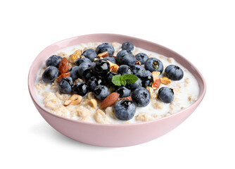 Tasty oatmeal porridge with blueberries on white background. Healthy meal