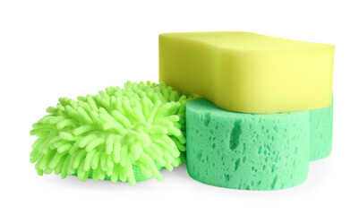 Sponges and car wash mitt on white background