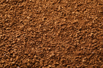 Aromatic instant coffee as background, closeup view