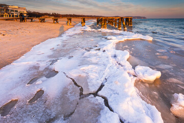Early morning at frozen small pier in Sopot. Poland.