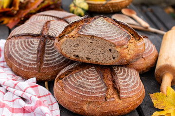 Homemade bread on wooden table. Bread texture of whole grain bread
