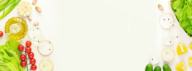 Healthy food banner. Vegan or vegetarian diet. Natural fresh vegetables and olive oil on white background with copy space. Ingredients for salad. Flat lay, Banner size