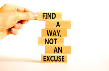 Find a way not excuse symbol. Concept words Find a way not an excuse on wooden blocks on a beautiful white table white background. Businessman hand. Business motivational and not excuse concept.