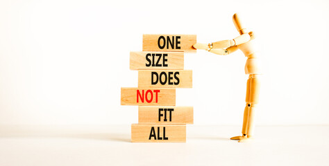 One size does not fit all symbol. Concept words One size does not fit all on wooden blocks....