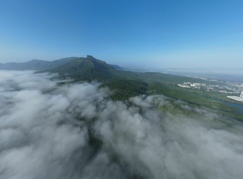 Shot from plane window to winter foggy morning with mountains in back in Badlapur town near Mumbai