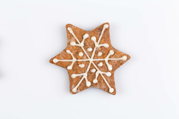 Fototapeta na wymiar Star shape christmas gingerbread cookie