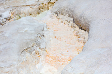 Stream in white volcanic rock.