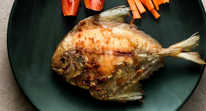 Pomfret fish or ikan Bawal, that have been cooked or fried well