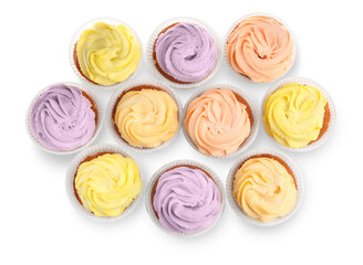 Tasty cupcakes with cream isolated on white, top view