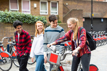 Teen group of friends walking together in the city - 540453876