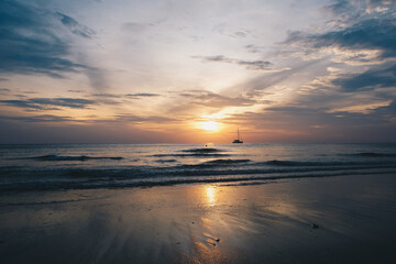 Fototapeta na wymiar Serenity sea beach wave sunset sky with cloud nature landscape