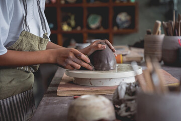 Fototapeta na wymiar The master class in big workshop on making clay products