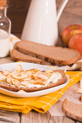 Rye bread with apple in crispy slices with skin.