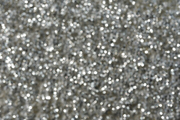 silver and white bokeh lights abstract background