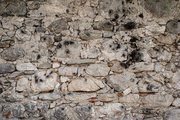 Gabion retaining wall made of concrete and stone in a mountainous terrain