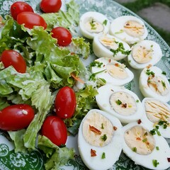 Colorfull low carbohydrate meal with boiled eggs and fresh salad for healthy life. Paleo food. Simple lowcarb meal.