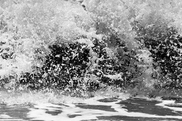 sea waves with foam. black and white beach photography