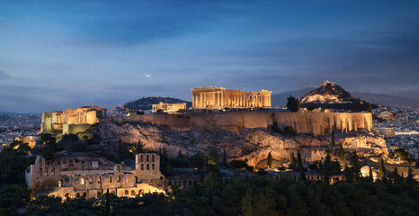 Panorama of Athens with Acropolis hill, Greece. Famous old Acropolis is a top landmark of Athens. Landscape of the Athens city with classical Greek ruins. Scenic view of remains of ancient Athens.