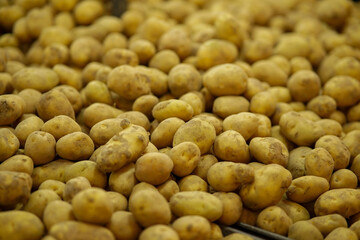 Potatoes for sale on the market stock photo
