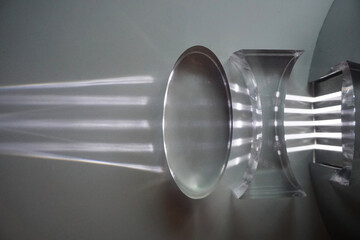 Parallel light is refracted through the convex lens and a concave lens.  Optics physics.