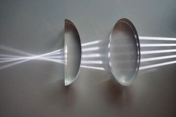Parallel light refracted through plano-convex lens and convex lens.  Optics physics.
