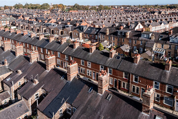 Aerial view of rows of back to back terraced house in a UK city
