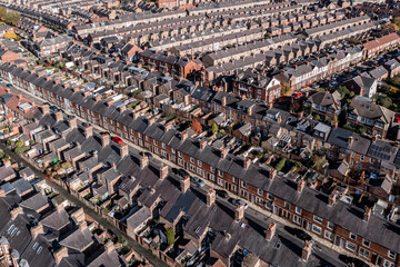 Aerial view of rows of back to back terraced house in a Northern UK city
