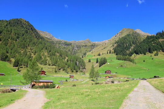 Villgraten alpine mountain landscape with traditional alm houses near to Sillian in Innervillgraten, Oberstalleralm
