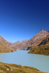 Mauvoisin reservoir located in Val de Bagnes, Valais with concrete arch dam, Switzerland