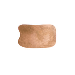 massage scraper gua sha copper on white background