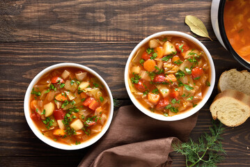 Cabbage soup in bowls